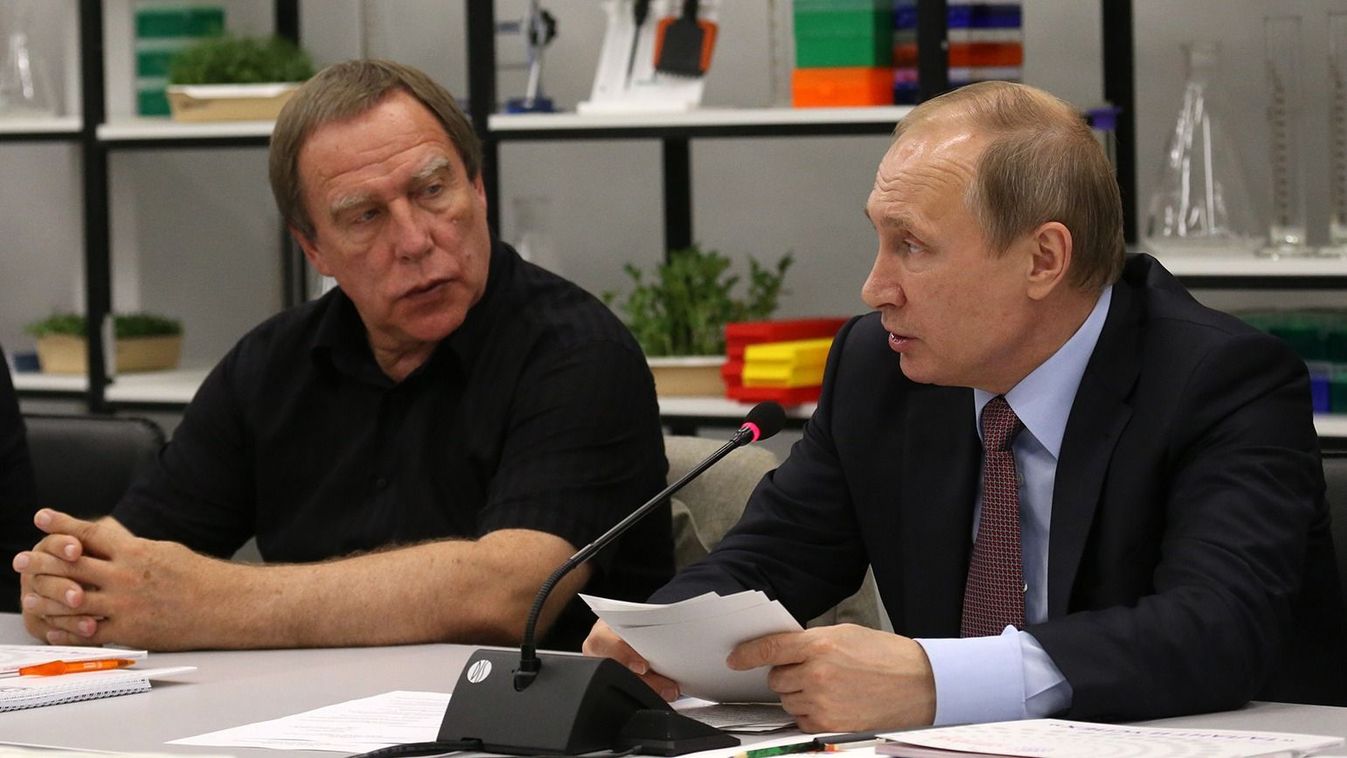 Vladimir Putin Visits Sochi
SOCHI, RUSSIA - JULY 19: (RUSSIA OUT) Russian President Vladimir Putin (R) talks as cellist and businessman Sergei Roldugin (R) looks on during the meeting of the Board of trustees of the Sirius education center for gifted children on July 19, 2016 in Sochi, Russia. Vladimir Putin said the latest report on doping among Russian athletes lacked substance and was highly political. The Russian president said officials named in the report will be temporarily suspended. (Photo by Mikhail Svetlov/Getty Images)