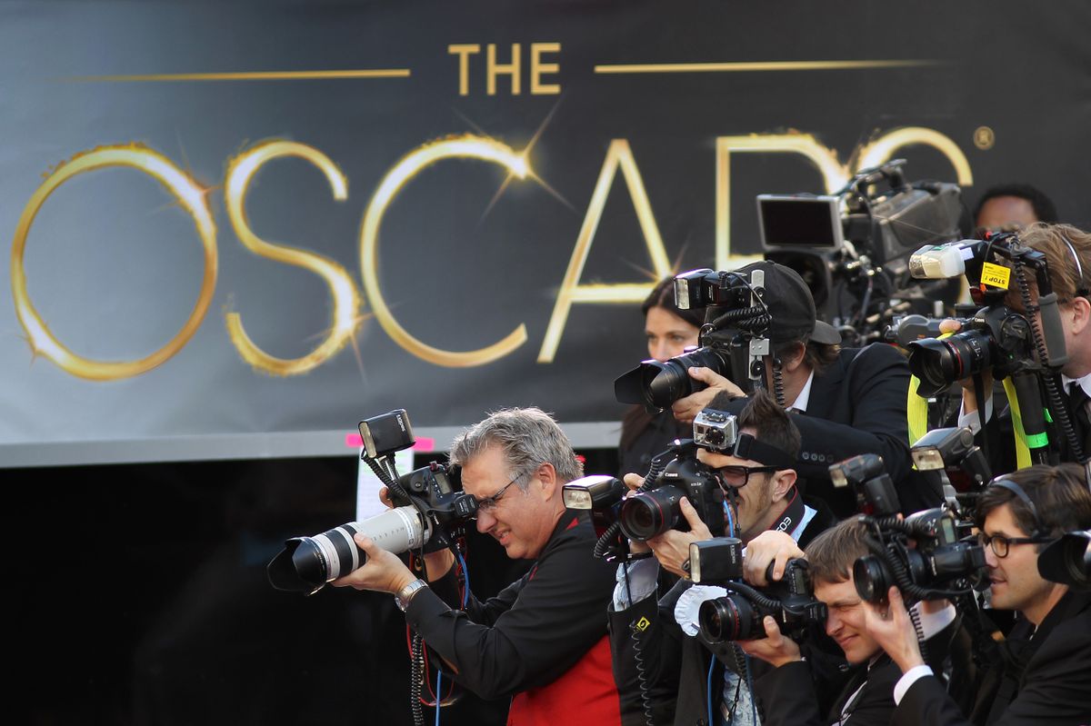 HOLLYWOOD, CA - FEBRUARY 24:  Photographers cover the red carpet arrivals to the 85th Annual Academy Awards at the Hollywood & Highland Center on February 24, 2012 in Hollywood, California.  (Photo by David McNew/Getty Images)