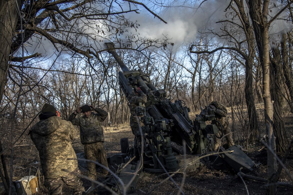 CHASIV YAR, DONETSK PROVINCE, UKRAINE, MARCH 05: Ukrainian servicemen fire an artillery cannon aiming to Russian positions in the frontline nearby Bakhmut in Donbas, Ukraine, March 5th, 2023. 