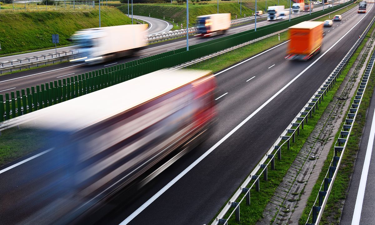 Trucks,On,Four,Lane,Controlled-access,Highway,In,Poland. Trucks on four lane controlled-access highway in Poland.
export, import, külker, KSH