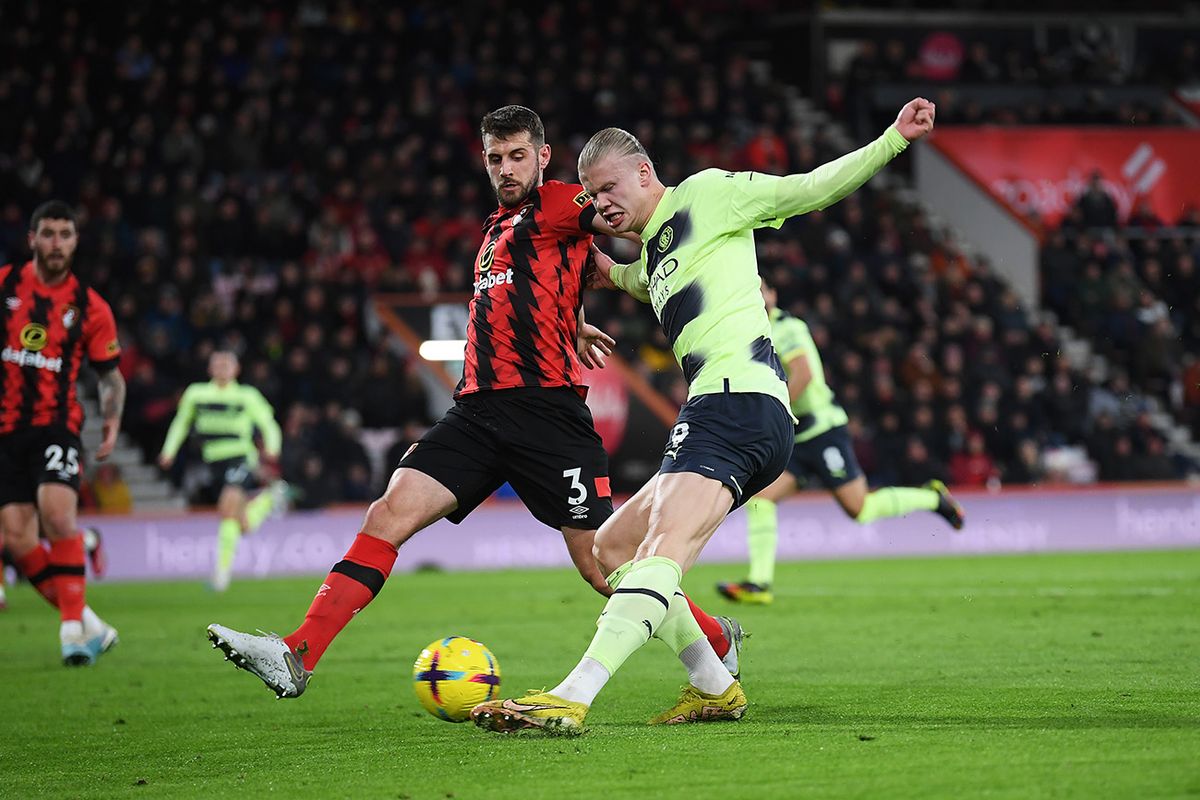 AFC Bournemouth v Manchester City - Premier League BOURNEMOUTH, ENGLAND - FEBRUARY 25: Erling Haaland of Manchester City is challenged by Jack Stephens of AFC Bournemouth during the Premier League match between AFC Bournemouth and Manchester City at Vitality Stadium on February 25, 2023 in Bournemouth, England. (Photo by Manchester City FC/Manchester City FC via Getty Images)