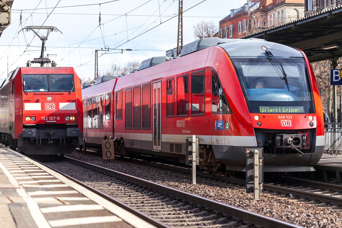 Fuerth,/,Germany,-,March,11,,2018:,Re,Regional,Express
FUERTH / GERMANY - MARCH 11, 2018: RE Regional Express train from Deutsche Bahn passes train station fuerth in germany.