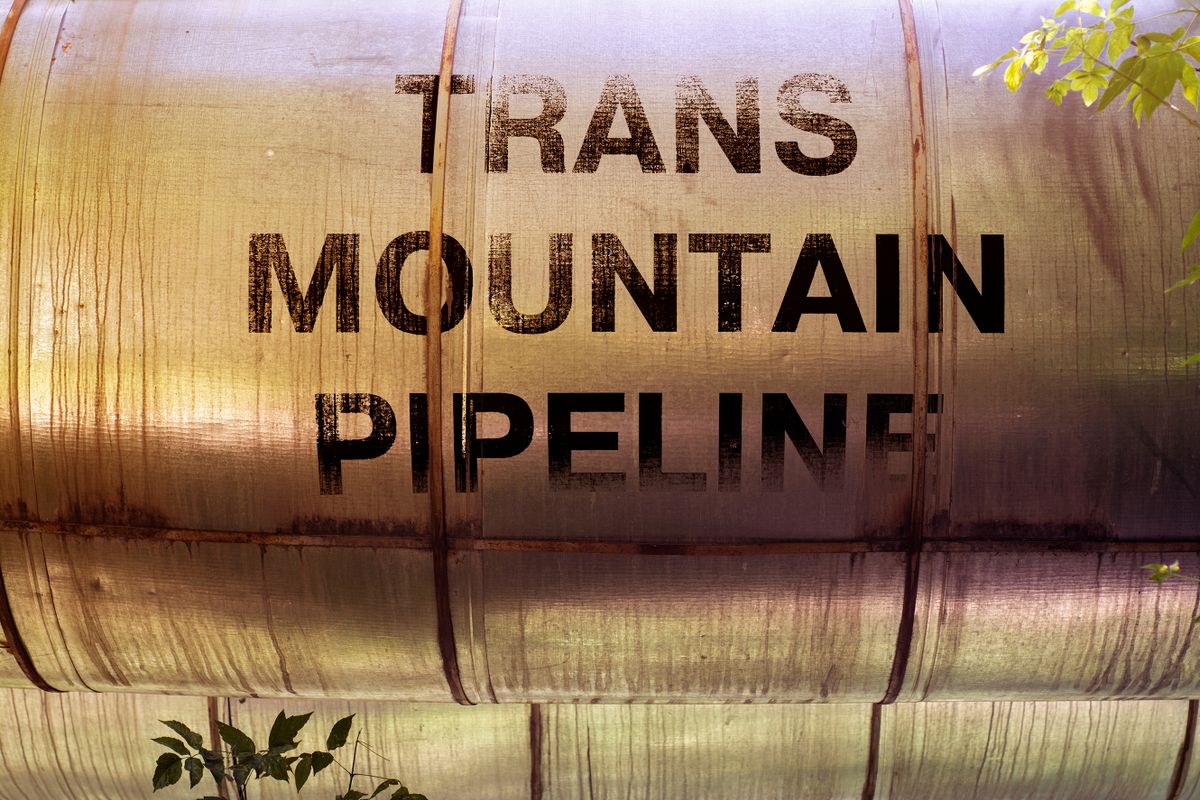 Pipeline,Passing,Through,The,Forest,With,The,Inscription,Trans,Mountain