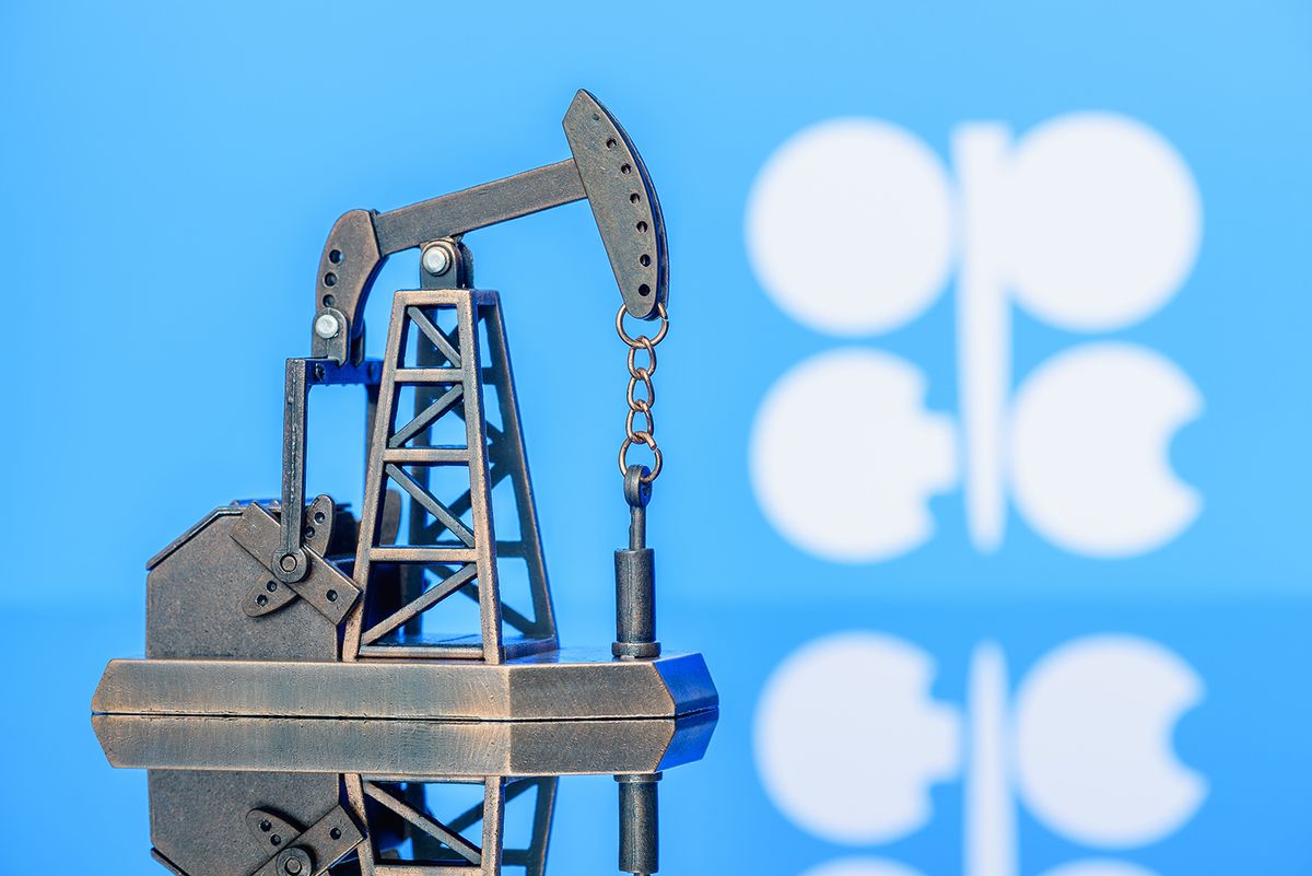 Petroleum,,Petrodollar,And,Crude,Oil,Concept,:,Pump,Jack,And
Petroleum, petrodollar and crude oil concept : Pump jack and flag of OPEC or Organization of Oil Exporting Countries, depicts the investment in the development or production of global oil industry.