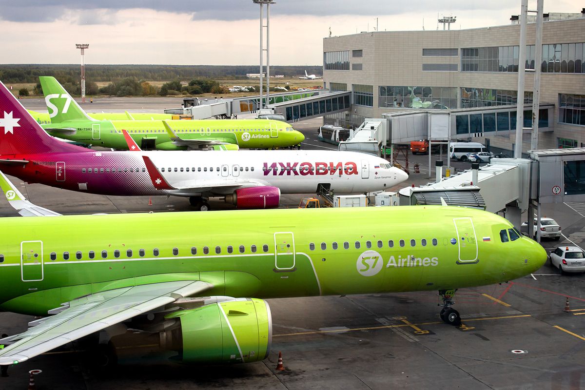 Aircraft from S7 Airlines and Izhavia Airlines are seen at
MOSCOW, RUSSIA - 2022/09/23: Aircraft from S7 Airlines and Izhavia Airlines are seen at the Domodedovo airport in Moscow. (Photo by Vlad Karkov/SOPA Images/LightRocket via Getty Images)
