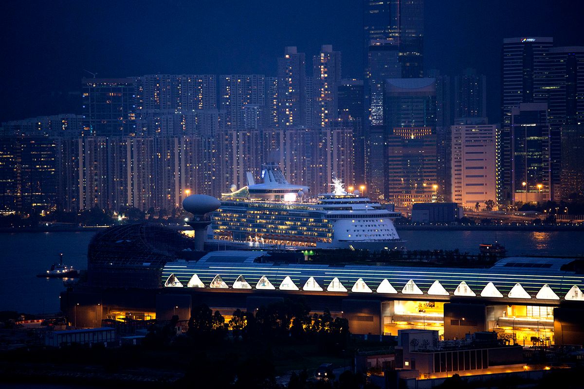 Kai Tak Cruise Terminal Receives First Cruise Ship Royal Caribbean Cruises Ltd.'s Mariner of the Seas ocean liner, arrives at the Kai Tak Cruise Terminal, built on the site of the former Kai Tak Airport, in Hong Kong, China, on Wednesday, June 12, 2013. Hong Kong has turned the former airport into an HK$8.2 billion ($1.1 billion) cruise terminal as the city seeks to woo wealthy Chinese travelers to help it become Asias hub for luxury liners. Photographer: Jerome Favre/Bloomberg via Getty Images