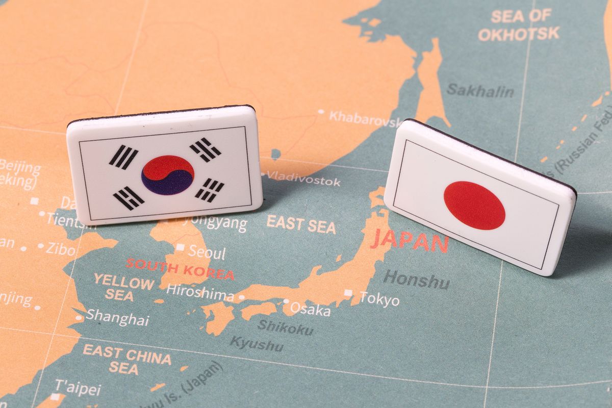 South,Korea,And,Japan,Flags,On,Map