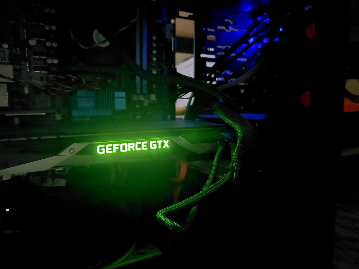 Cryptocurrency Mining
Close-up of glowing logo for an NVIDIA Geforce GTX graphics card inside a computer in a darkened room engaging in cryptocurrency mining, including for Bitcoin, San Ramon, California, October 23, 2019. (Photo by Smith Collection/Gado/Getty Images)