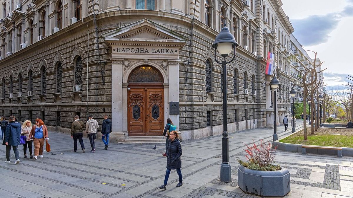 Belgrade,,Serbia,-,November,28,,2021:,People,Walking,In,Front
Belgrade, Serbia - November 28, 2021: People Walking in Front of Historic Building Old Serbian National Bank.