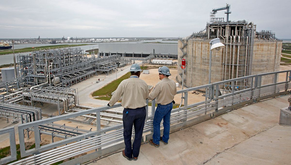 Operators Maurice Jones, left, and supervisor Chad Horton,
UNITED STATES - APRIL 01:  Operators Maurice Jones, left, and supervisor Chad Horton, look down on the Freeport LNG facility in Quintana, Texas, U.S., on Wednesday, April 1, 2009. This facility boasts two gigantic LNG tanks that can each store 1 million barrels of LNG at 260 degrees below zero after being off loaded from tanker ships at their nearby dock. The cold LNG is then vaporized and transferred to pipelines at 1200 psi.  (Photo by Craig Hartley/Bloomberg via Getty Images)
