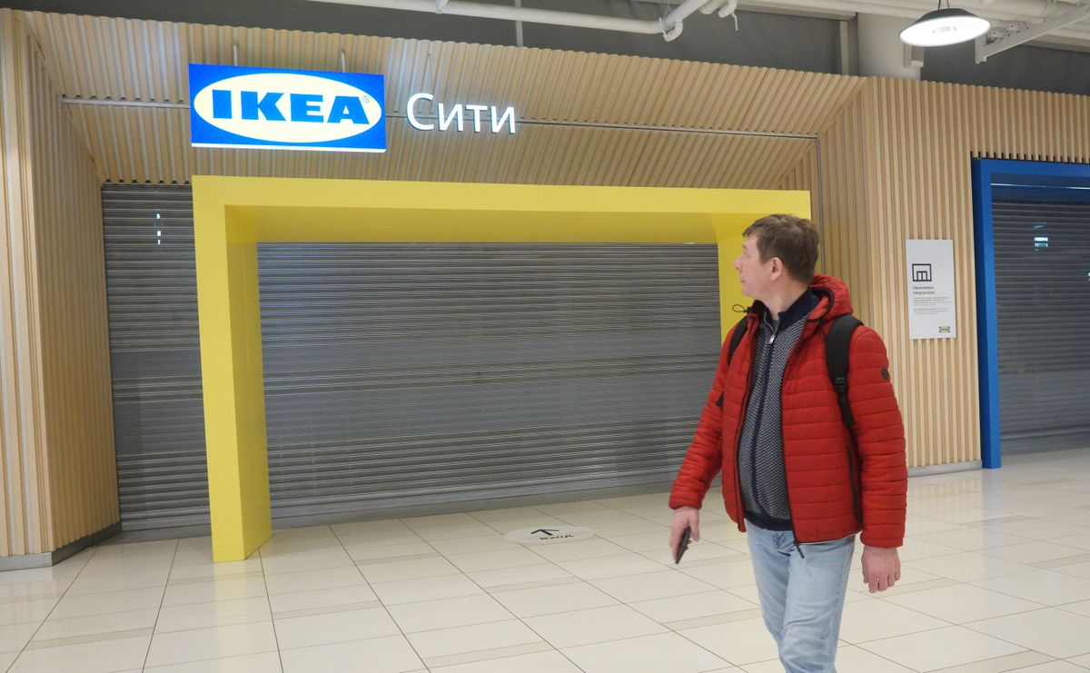 MOSCOW, RUSSIA - ARRIL 24:  (RUSSIA OUT) A man walks by Sweden-based home decor store IKEA, closed due to the military invasion of Ukraine, April 24, 2022 in Belaya Dacha, outside of Moscow, Russia. President Vladimir Putin said at a news conference April 12 that Russia has withstood the Western blitz of sanctions, insisting the measures will backfire.  (