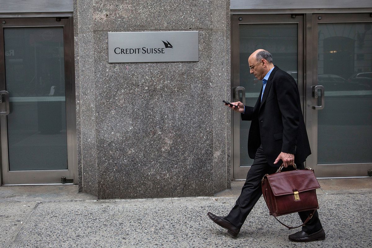 Credit Suisse Charged With Helping US Clis
NEW YORK, NY - MAY 19:  A man walks past the New York offices of Credit Suisse on May 19, 2014 in New York City. Credit Suisse is expected to plead guilty to one count of criminal wrongdoing by conspiring to aid tax evasion for U.S. clients, the first time a global banking giant has done so, in a deal that will cost the company $2.6 billion in penalties, according to published reports.  (Photo by Andrew Burton/Getty Images)