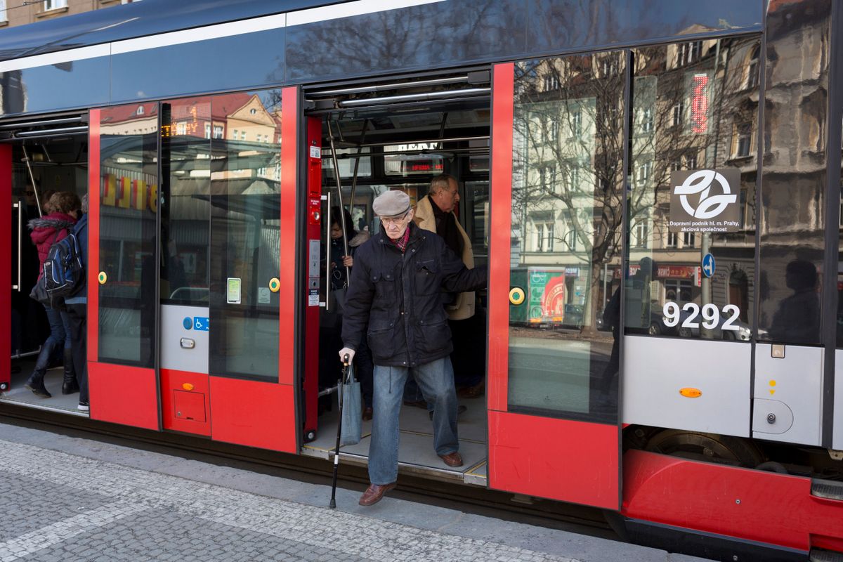 Elderly Czech Passenger Exits Tram