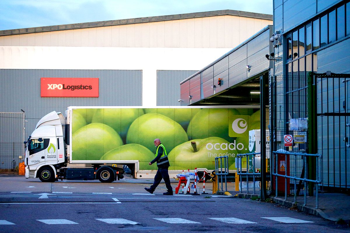 Covid-19 Lockdowns Provide Boost For Online Grocery And Takeaway Sales
A delivery truck operated by Ocado Group Plc reverses into a loading bay at their fulfilment centre in Enfield, U.K., on Wednesday, Sept. 30, 2020. Covid-19 lockdown enabled online and app-based grocery delivery service providers to make inroads with customers they had previously struggled to recruit, according the Consumer Radar report by BloombergNEF. Photographer: Hollie Adams/Bloomberg via Getty Images