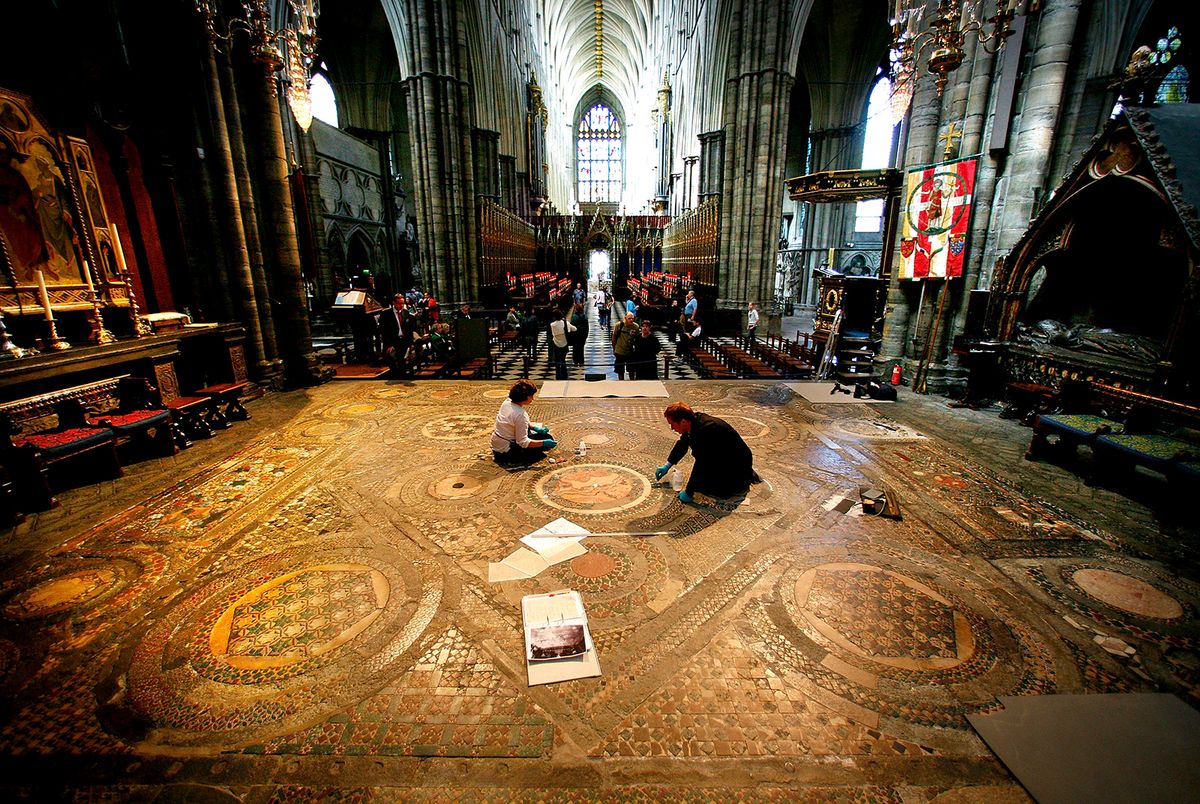 Cosmati Pavement Restoration Begins At Westminster Abbey
LONDON - MAY 06:  Conservators carry out restoration of Westminster Abbey's Cosmati Pavement on May 6, 2008 in London, England. Centuries of dirt and grime will be painstakingly removed from this work of medieval craftsmanship during a 535,000 GBP restoration project. The 56 sq/m intricate mosaic floor lies in front of the High Altar. Long hidden under rolls of carpet,  it is made from small inlaid pieces of semi-precious stone, marble, glass and metal set in squares and circles some of which is thought to have been recycled from the ruins of ancient Rome. Commissioned by Henry III to be a centrepiece of the re-built 13th century Abbey.  (Photo by Peter Macdiarmid/Getty Images)