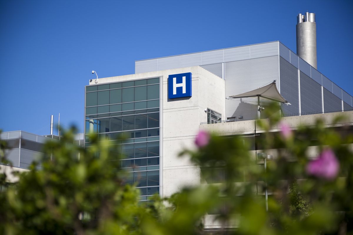 Modern,Hospital,And,Sign,With,Clear,Blue,Sky,Taken,In
