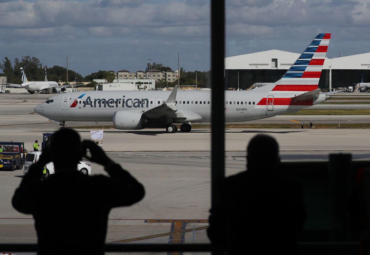 Boeing 737 Max Public Flights Resume As American Airlines Flies From Miami To New York
MIAMI, FLORIDA - DECEMBER 29: American Airlines flight 718, a Boeing 737 Max, pulls away from its gate at Miami International Airport on its way to New York on December 29, 2020 in Miami, Florida. The Boeing 737 Max flew its first commercial flight since the aircraft was allowed to return to service nearly two years after being grounded worldwide following a pair of separate crashes. (Photo by Joe Raedle/Getty Images)