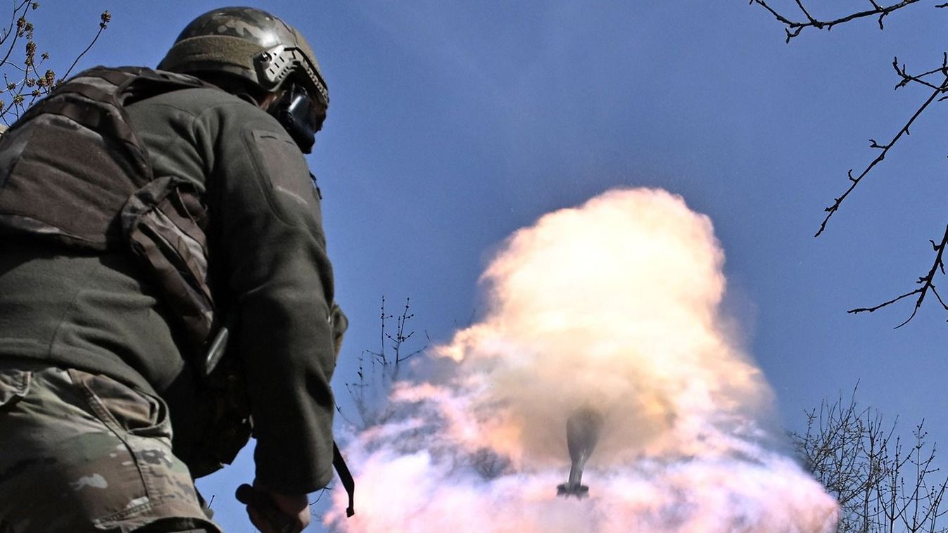 A Belarusian volunteer soldier from the Kastus Kalinouski regiment, a regiment made up of Belarusian opposition volunteers formed to defend Ukraine, fires a 120mm mortar round at a front line position near Bakhmut in the Donetsk region, on April 9, 2023, amid the Russian invasion of Ukraine. (Photo by Genya SAVILOV / AFP)
UKRAINE-RUSSIA-CONFLICT-WAR