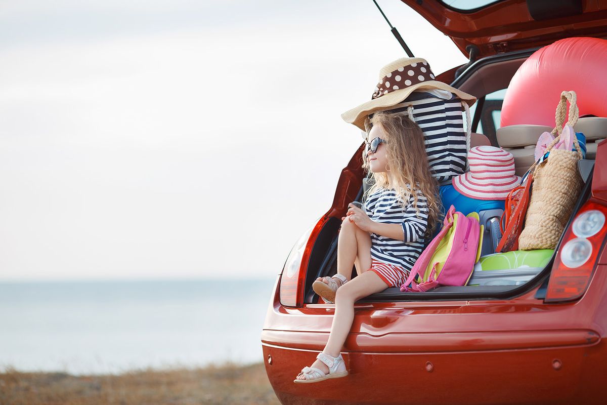 Vacation,,Travel,-,Family,Ready,For,The,Travel,For,Summer Vacation, Travel - family ready for the travel for summer vacation. suitcases and car with sea on background. girl with map in hands planning road trip. travel concept. traveler.