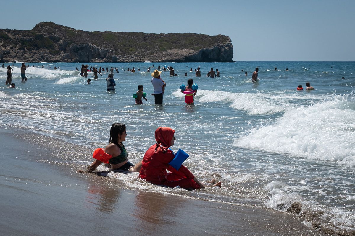 Tourists Visit Turkish Beaches Amid Covid-19 Pandemic
On 17 August, 2020, domestic and international tourists visited Patara beach in Turkey's Antalya district on the Mediterranean Sea, also known as the Turkish Riviera, despite an ongoing global coronavirus pandemic. (Photo by Diego Cupolo/NurPhoto) (Photo by Diego Cupolo / NurPhoto / NurPhoto via AFP)