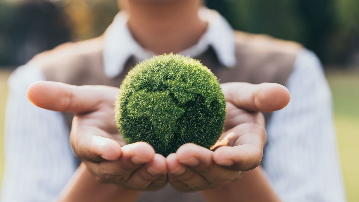 Asian,Teenager,Showing,Earth,On,Hand,,Ecology,And,Environment,Sustainable