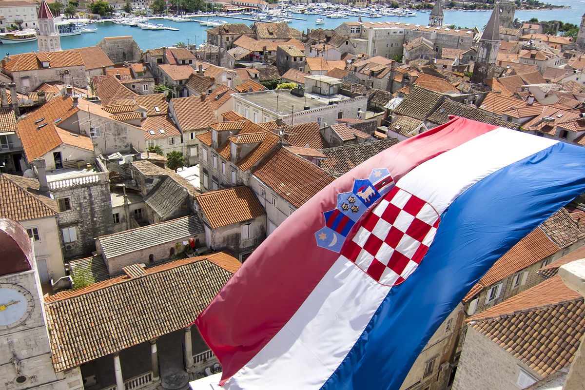Croatian,Flag,On,The,City,Of,Trogir,In,Dalmatia
croatian flag on the city of trogir in dalmatia