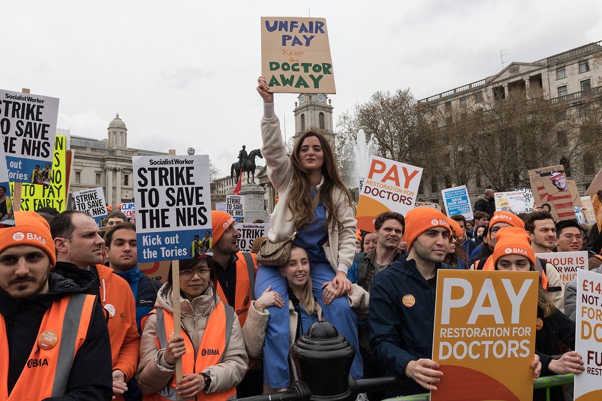 Junior Doctors Demonstration In London
LONDON, UNITED KINGDOM - APRIL 11, 2023: Junior doctors and supporters gather for a rally in Trafalgar Square as members of the British Medical Association take part in a four-day strike action over pay in London, United Kingdom on April 11, 2023. Over 61,000 junior doctors in England are taking part in the strike action demanding immediate pay restoration to reverse the real-term, inflation-driven cuts of 26% since 2008. (Photo by WIktor Szymanowicz/NurPhoto) (Photo by WIktor Szymanowicz / NurPhoto / NurPhoto via AFP)
Junior Doctors Demonstration In London