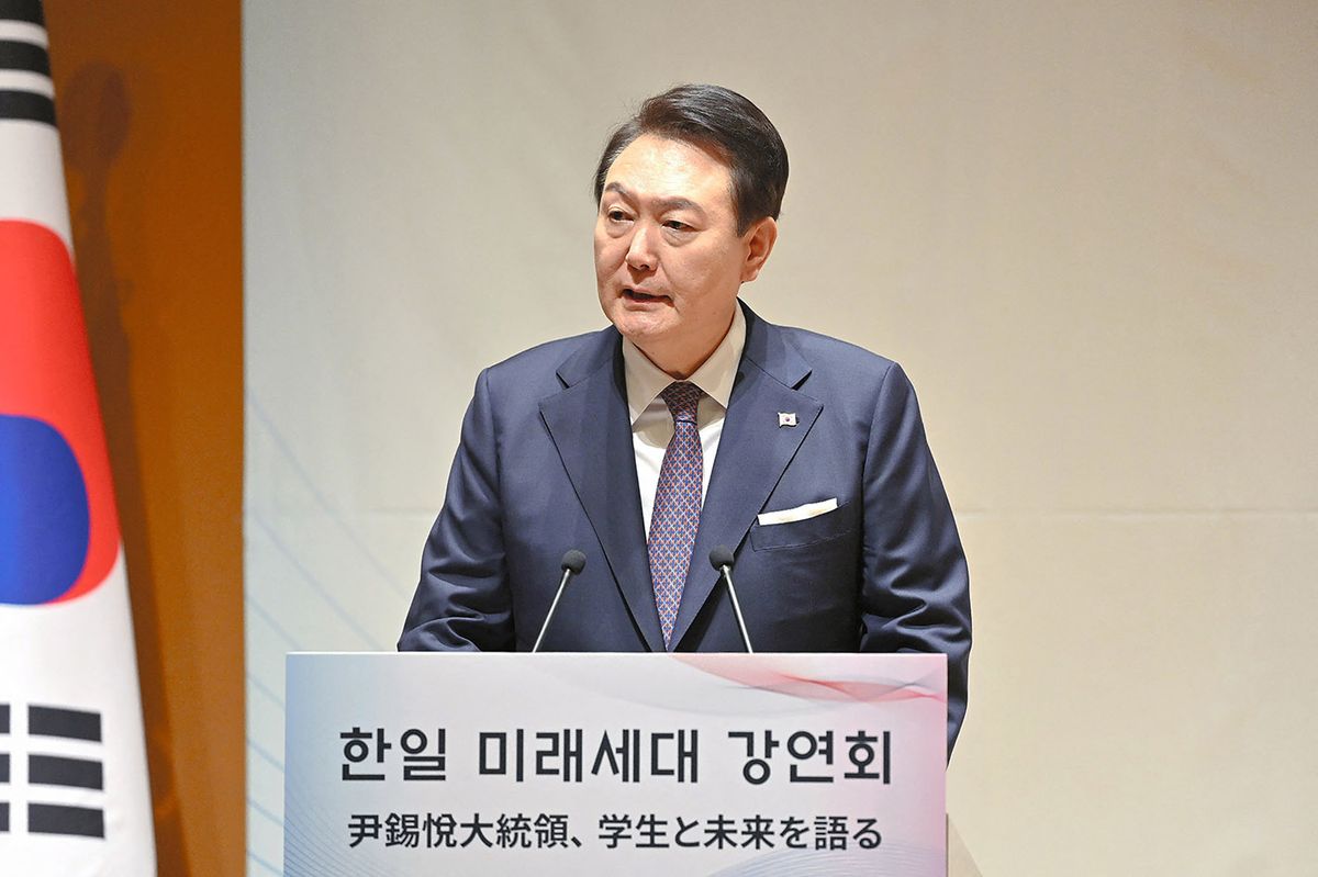 South Korea's President Yoon Suk Yeol gives a speech in front of students at Keio University on the sidelines of his visit to Tokyo on March 17, 2023. (Photo by JAPAN POOL / JIJI Press / AFP) / Japan OUT