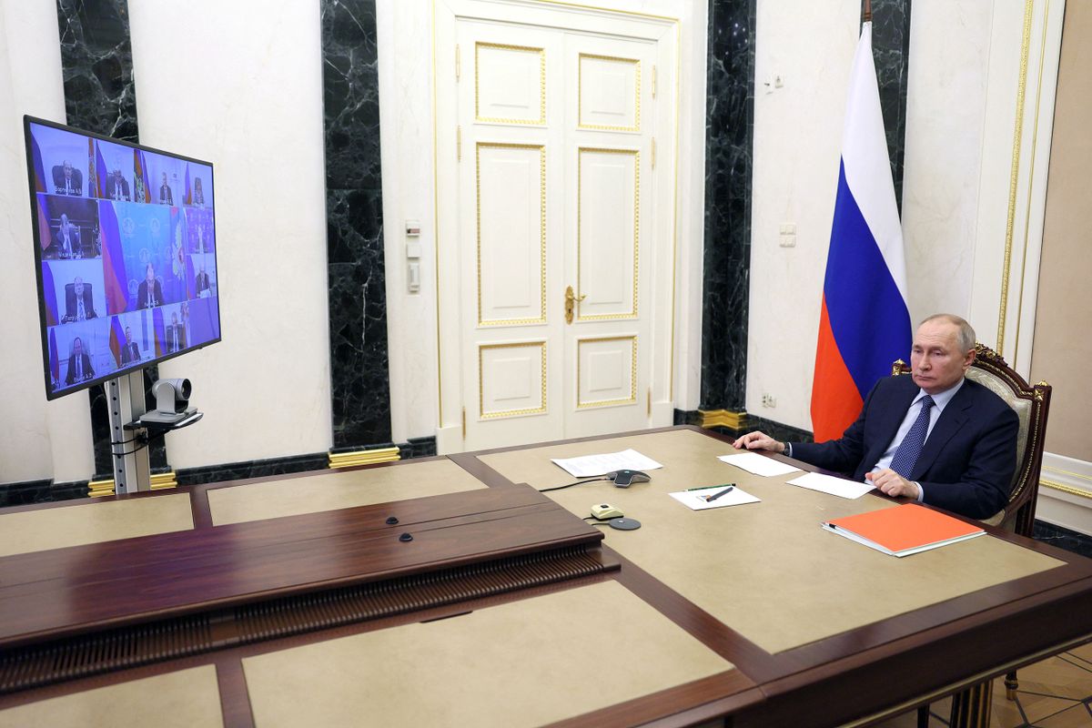 Russian President Vladimir Putin chairs a Security Council meeting via a video link at the Kremlin in Moscow on March 31, 2023.