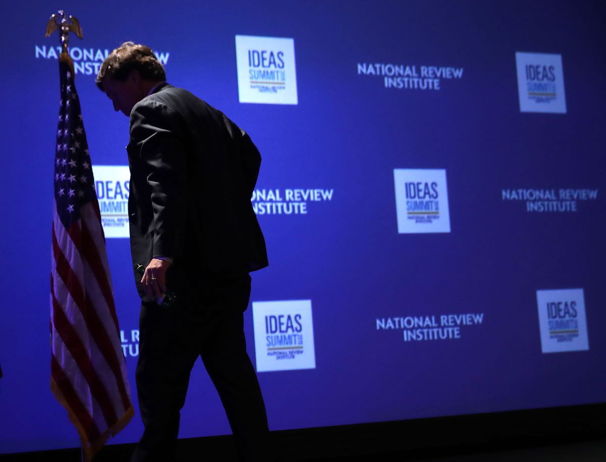 WASHINGTON, DC - MARCH 29: Fox News host Tucker Carlson leaves the stage after talking about 'Populism and the Right' during the National Review Institute's Ideas Summit at the Mandarin Oriental Hotel March 29, 2019 in Washington, DC. Carlson talked about a large variety of topics including dropping testosterone levels, increasing rates of suicide, unemployment, drug addiction and social hierarchy at the summit, which had the theme 'The Case for the American Experiment.'