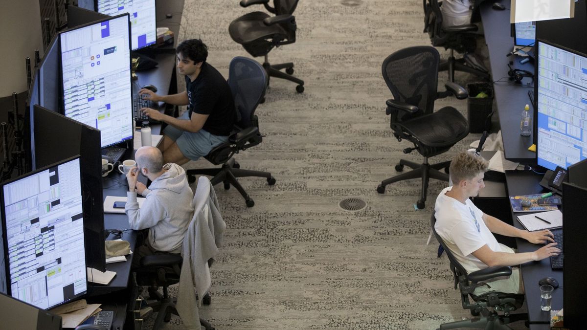 Traders at the Optiver BV offices in Sydney, Australia, on Monday, Dec. 19, 2022. Sydney has become an unlikely Asia-Pacific hub for tech-driven trading companies, a part of finance thats bucking the global trend of layoffs and pay cuts. 