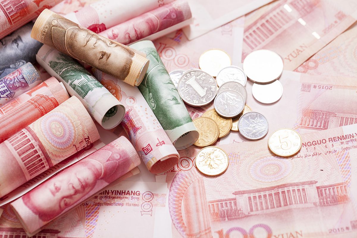Yuan,Notes,From,China's,Currency.,Chinese,Banknotes.,Chinese,Coins
Yuan notes from China's currency. Chinese banknotes. Chinese coins