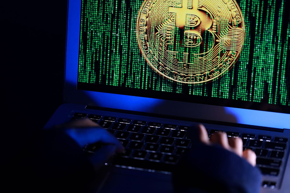 Hacker,With,Computer,Hacking,And,Stealing,Data,Information,,Selective,Focus
Hacker with computer hacking and stealing data information, Selective focus image on keyboard, Bitcoin logo and binary code as background. Bitcoin cryptocurrency security and privacy issues.