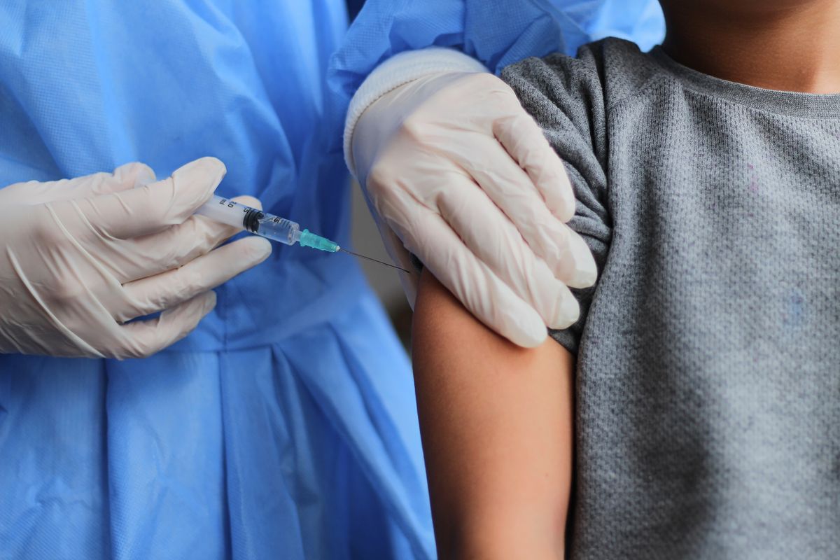 Little,Boy,Getting,Vaccinated,From,Covid-19.,A,Young,Doctot's,Hand
WHO