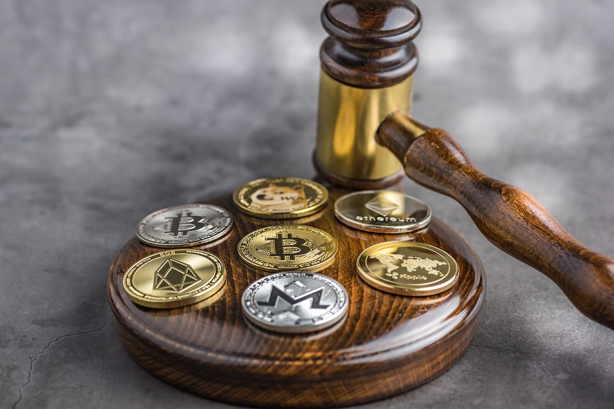 Different,Cryptocurrencies,And,Gavel,Over,Gavel,Wooden,Board.concept,Image,For