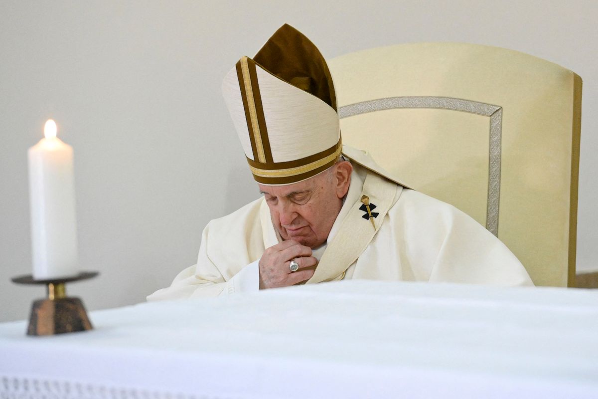 This photo taken and issued as a handout on April 6, 2023 by the Vatican Media shows Pope Francis pray while addressing young detainess, after performing the "Washing of the Feet" of twelve young detainees at the "Casal del Marmo" Penal Institute for minors in Rome, as part of celebrations of the Holy Week. 