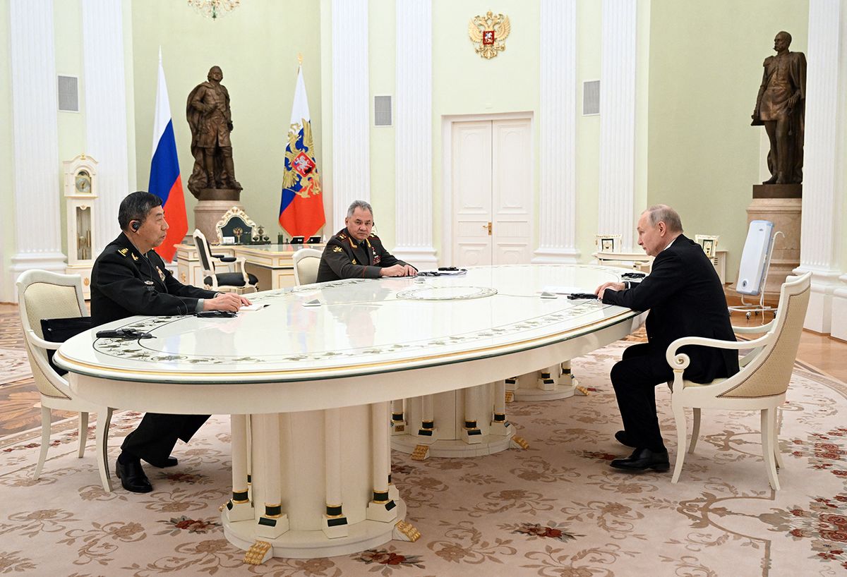 Russian President Vladimir Putin and Russian Defence Minister Sergei Shoigu meet with Chinese Defence Minister Li Shangfu at the Kremlin in Moscow on April 16, 2023. (Photo by Pavel BEDNYAKOV / SPUTNIK / AFP)
RUSSIA-CHINA-POLITICS-DIPLOMACY-DEFENCE-ARMY