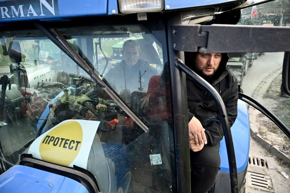 Farmers take part in an action to block trucks crossing the Danube bridge, marking the border between Bulgaria and Romania in a protest against the duty-free import of grain coming from Ukraine into the EU, in Rousse on March 29, 2023. 