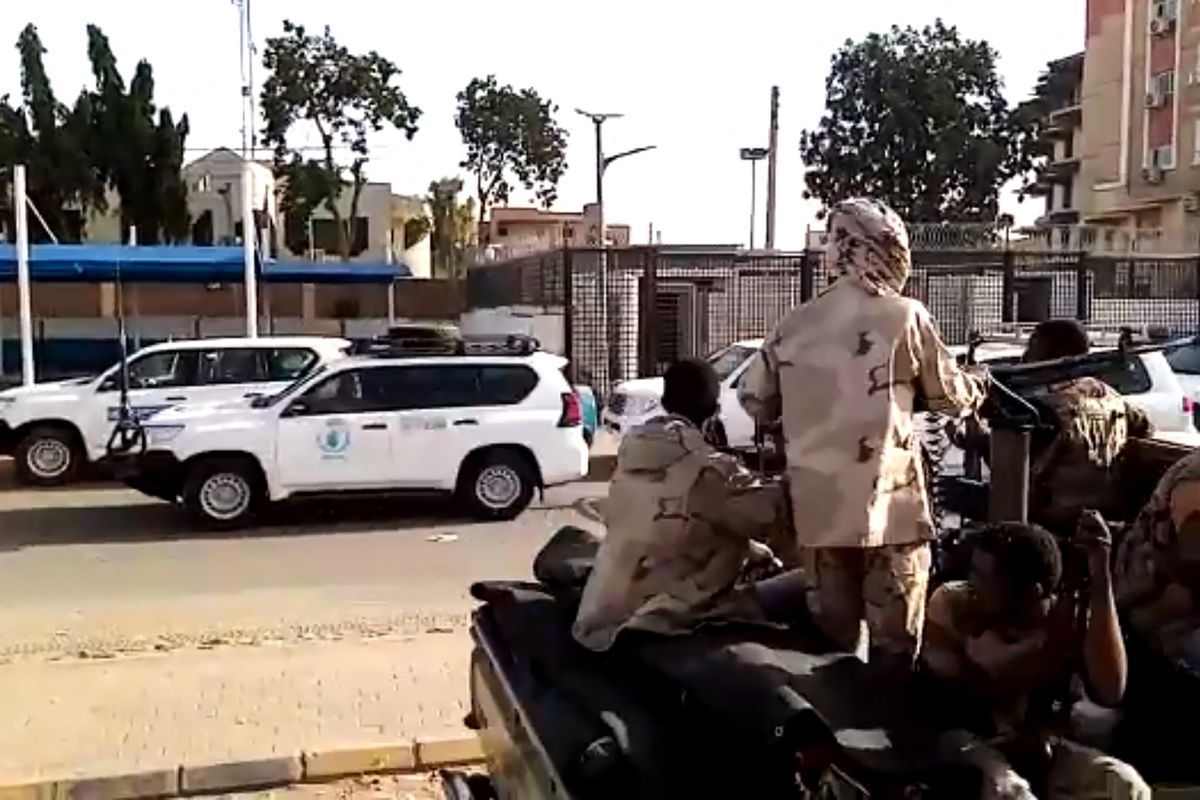 A grab taken from an AFPTV video shows a convoy leaving Khartoum towards Port Sudan, on April 23, 2023, as people flee the battle-torn Sudanese capital. (Photo by Abubakarr JALLOH / AFP)