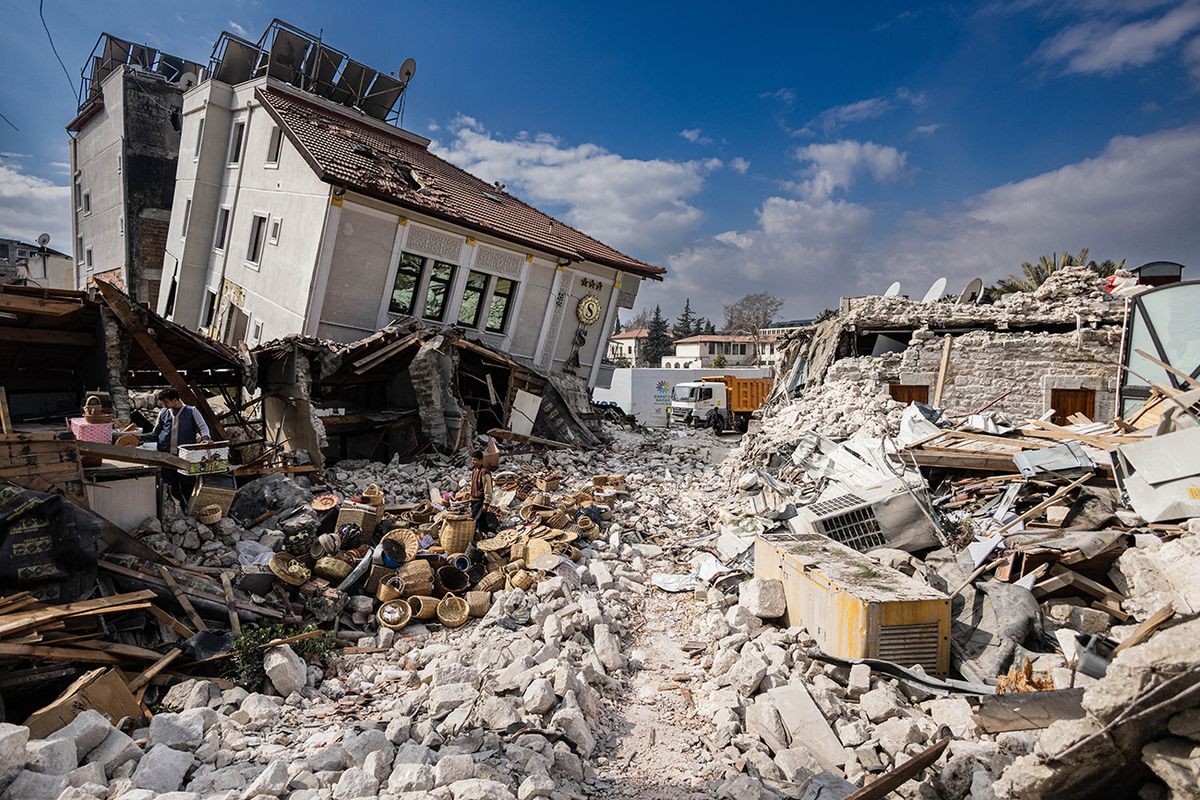 This photograph shows collapsed buildings in the city of Antakya on February 19, 2023. - A 7.8-magnitude earthquake hit near Gaziantep, Turkey, in the early hours of February 6, followed by another 7.5-magnitude tremor just after midday. The quakes caused widespread destruction in southern Turkey and northern Syria and has killed more than 44,000 people. (Photo by Sameer Al-DOUMY / AFP)