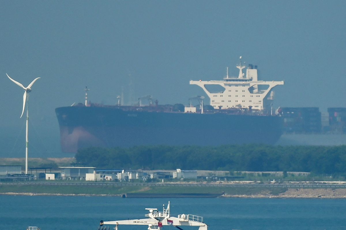 The crude oil tanker Nautica is pictured at an anchorage in Singapore on April 18, 2023, on its way from China to Yemen. - The supertanker crude carrier Nautica bought by the United Nations to remove oil from a ship abandoned off war-ravaged Yemen's coast is on its way from China, the UN has said, calling it a "significant" step in efforts to prevent a major spill. (Photo by Roslan RAHMAN / AFP)