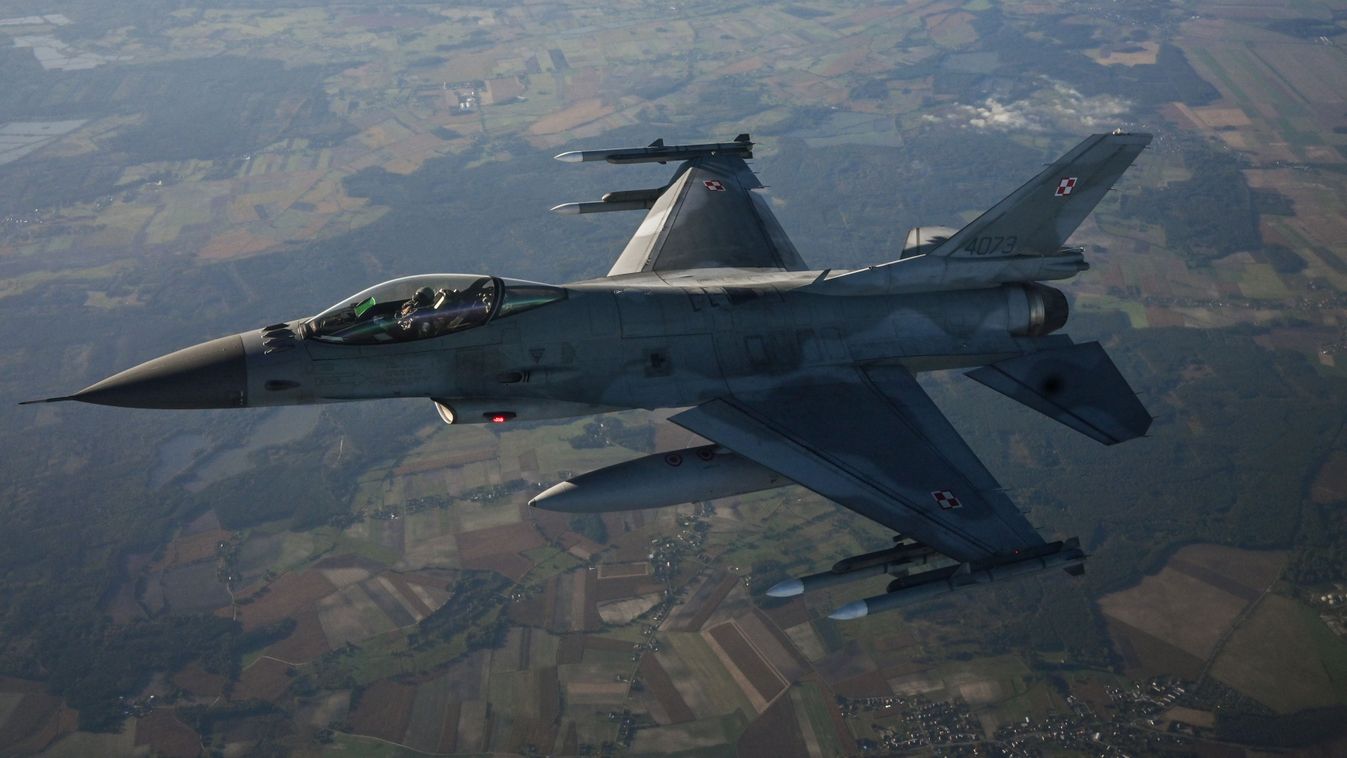 LASK, POLAND - OCTOBER 12: F-16 Fighting Falcon from the Polish Air Force takes part in a NATO air Shielding exercise at the  Lask Air Base on October 12, 2022 in Lask, Poland. NATO's Allied Air Command, the Polish Air Force and the United States Air Force demonstrate the modern aircraft capabilities of Polish F-16s and the U.S. F-22s. As the Russian Invasion of Ukraine continues, NATO member Poland has been investing in new military equipment and various NATO allies' troops are now stationed in the country. 