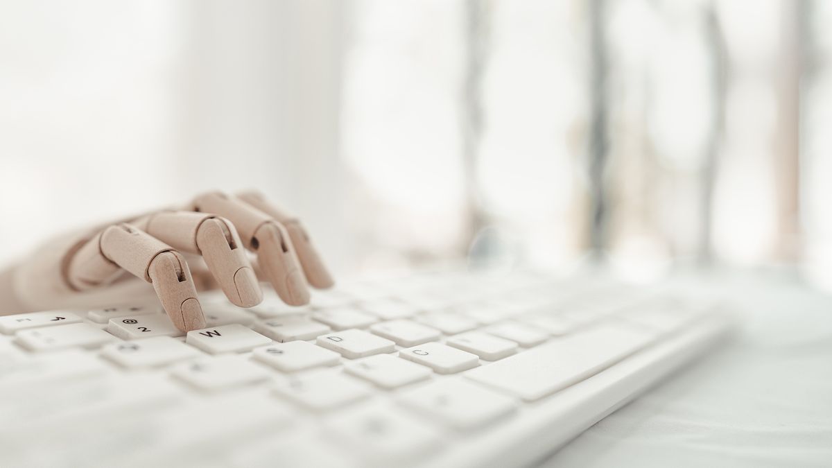 Computer,Keyboard,With,Wooden,Dummy,Hands,Typing,Isolated,On,White