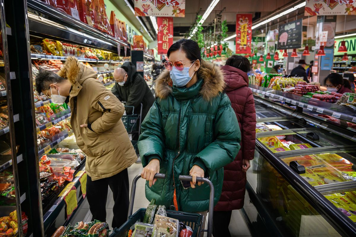 BEIJING, CHINA - JANUARY 28: A Chinese woman wears a protective mask and sunglasses as she shops for groceries at a supermarket during the Chinese New Year and Spring Festival holiday on January 28, 2020 in Beijing, China. The number of cases of a deadly new coronavirus rose to over 4000 in mainland China Tuesday as health officials locked down the city of Wuhan last week in an effort to contain the spread of the pneumonia-like disease which medicals experts have confirmed can be passed from human to human. In an unprecedented move, Chinese authorities put travel restrictions on the city which is the epicentre of the virus and neighbouring municipalities affecting tens of millions of people. The number of those who have died from the virus in China climbed to over 100 on Tuesday and cases have been reported in other countries including the United States, Canada, Australia, France, Thailand, Japan, Taiwan and South Korea. Due to concerns over the spread of the virus, the Beijing government closed many popular attractions such as the Forbidden City and sections of the Great Wall among others