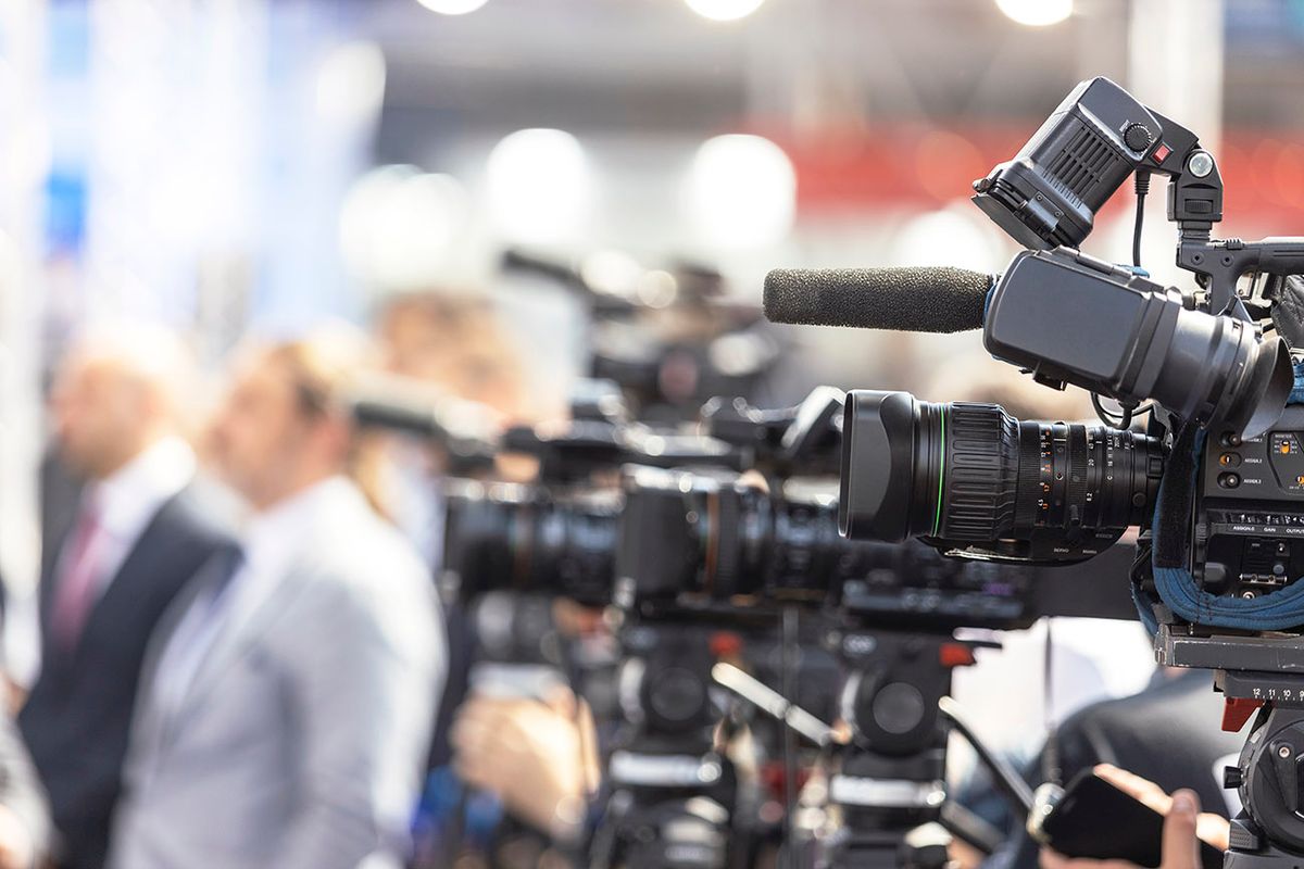 News Conference. Filming Media Event With A Video Camera.
Oroszország, orosz, újságíró