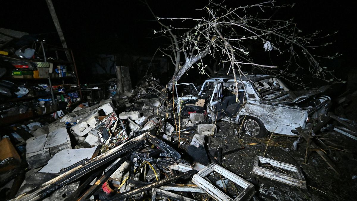 This  picture shows a car destroyed by shelling in the village of Kotlyary, in the Kharkiv region, late on April 22, 2023, amid the Russian invasion on Ukraine. 