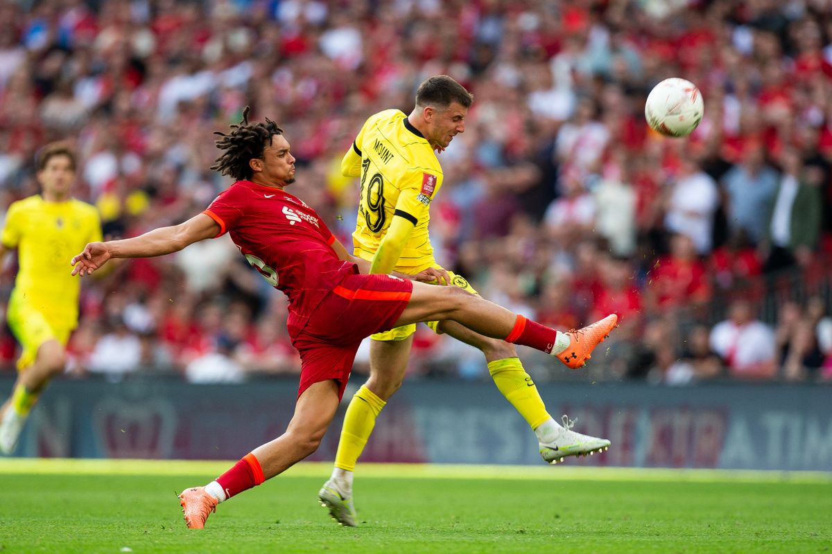 Mason Mount of Chelsea and Trent Alexander-Arnold of Liverpool battle for the ball during the FA Cup Final between Chelsea and Liverpool at Wembley Stadium, London on Saturday 14th May 2022.