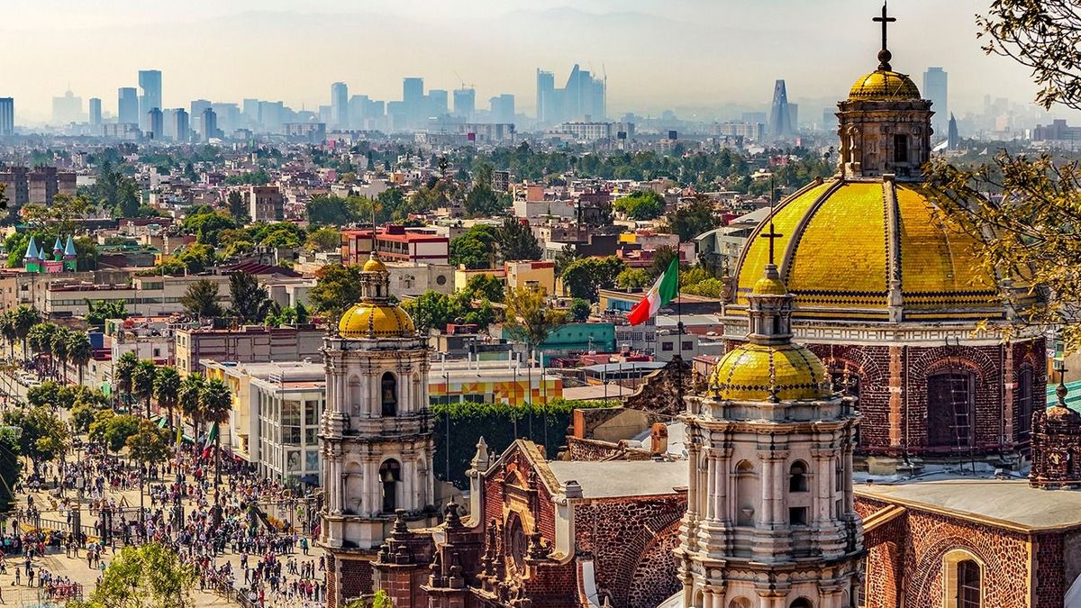 Mexico.,Basilica,Of,Our,Lady,Of,Guadalupe.,Cupolas,Of,The
Mexico. Basilica of Our Lady of Guadalupe. Cupolas of the old basilica and cityscape of Mexico City on the far