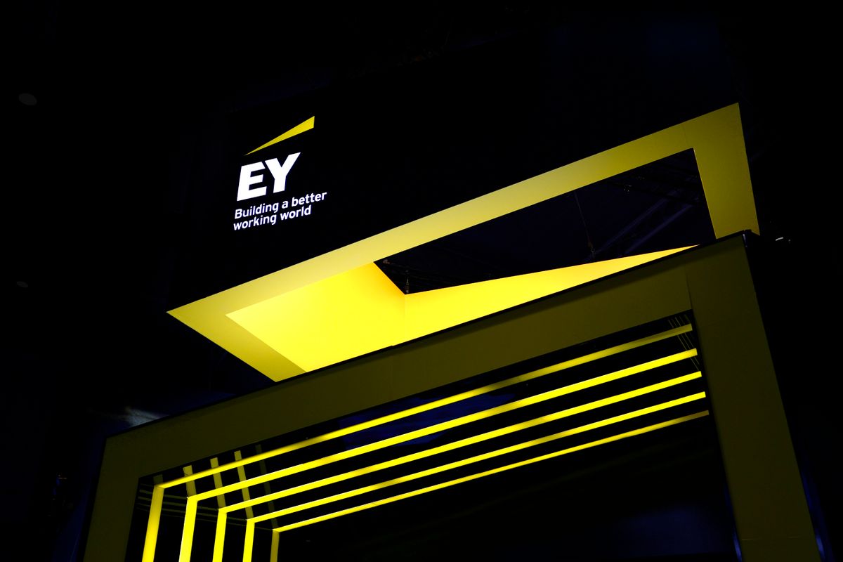 The Ernst &amp; Young Global Limited (EY) logo, one of the largest professional services networks in the world and one of the Big Four accounting firms, displayed on their stand during the Mobile World Congress 2023 on March 2, 2023, in Barcelona, Spain. 