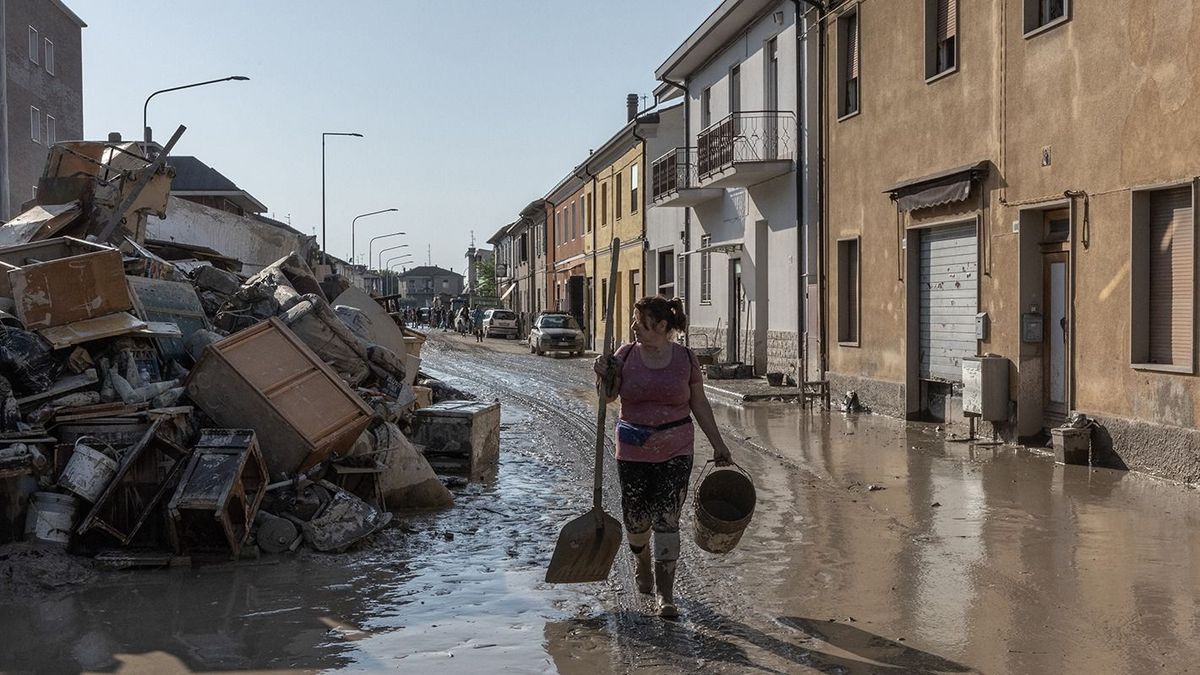 Italy's flood-ravaged region still on red alertFORLI, ITALY - MAY 21: Volunteers help residents to clear streets and homes by shoveling mud in neighborhoods that have been submerged after floods in Forli, Emilia Romagna, Italy on May 21, 2023. Italy’s northern Emilia-Romagna region, hit by torrential rains earlier this week, is still on red alert for extreme weather as its struggling population tries to recover from the worst floods in about a century. Andrea Carrubba / Anadolu Agency (Photo by Andrea Carrubba / ANADOLU AGENCY / Anadolu Agency via AFP)